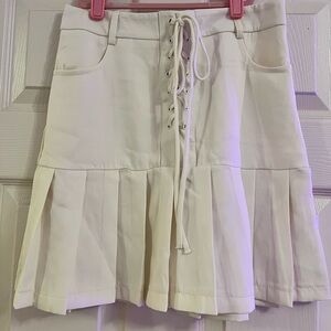 White Pleated Skirt with Lace-Up Front